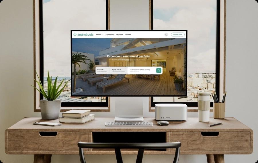 Foto de um computador utilizando o site imobiliário Jetimob